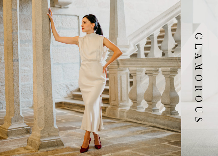 looks elegantes mujer con vestido blanco stilettos rojos
